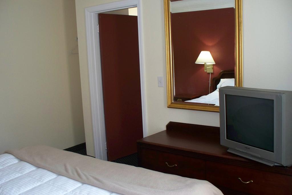 Budget Inn & Suites Wall Exterior photo